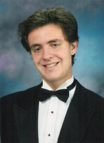 matthew valencia in HS senior photo in tux again