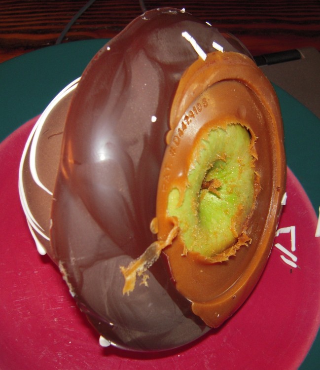 The bottom of Costco's chocolate-covered caramel apple