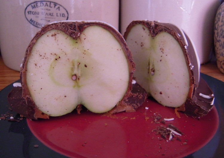Costco's chocolate-covered caramel apple cut in half