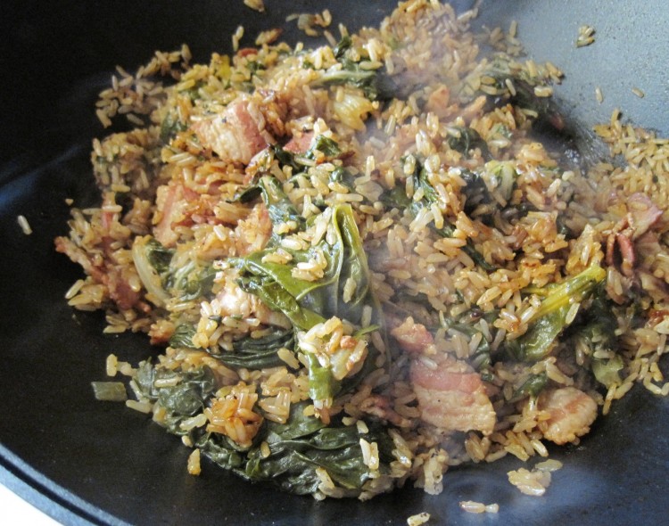Spanish-style chard and brown rice in a wok ready to serve