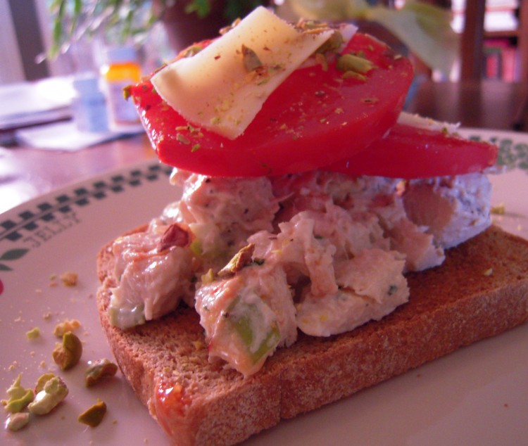 Chicken salad and heirloom tomato sandwich