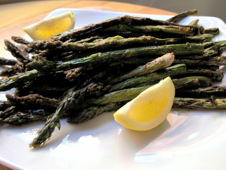 Tandoor asparagus on a white plate