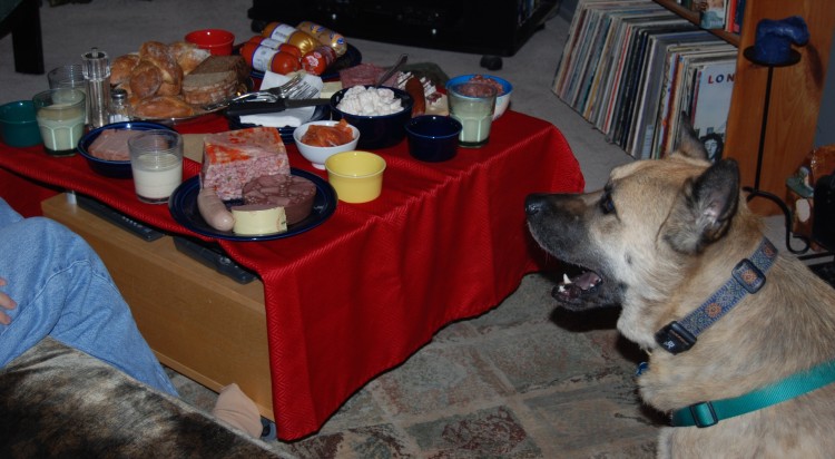 Even Berry, the akita-chow, looks amazed by our Christmas Eve spread. Christmas Eve is my favorite day of the year, and I track down traditional German goodies to serve