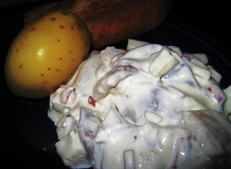 Renate's Herring Salad in Northern German Style with a yellow potato